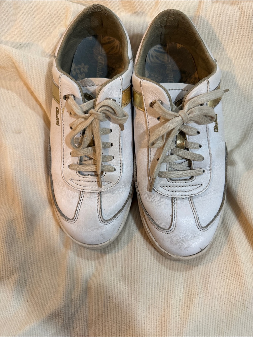 OluKai Women’s White Sneakers with Gold Accent